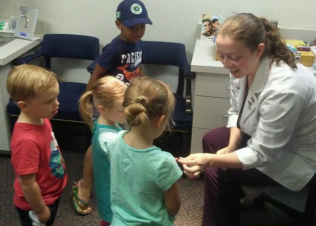 doctor playing with the children